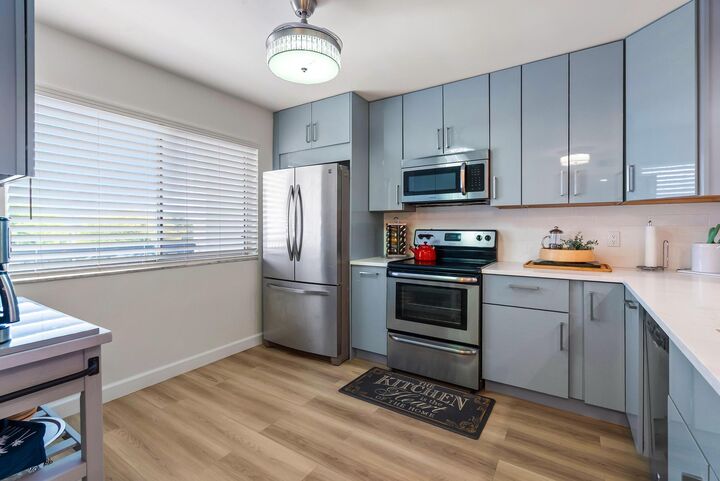 Property Photo:  6698 10th Avenue N 408  FL 33467 