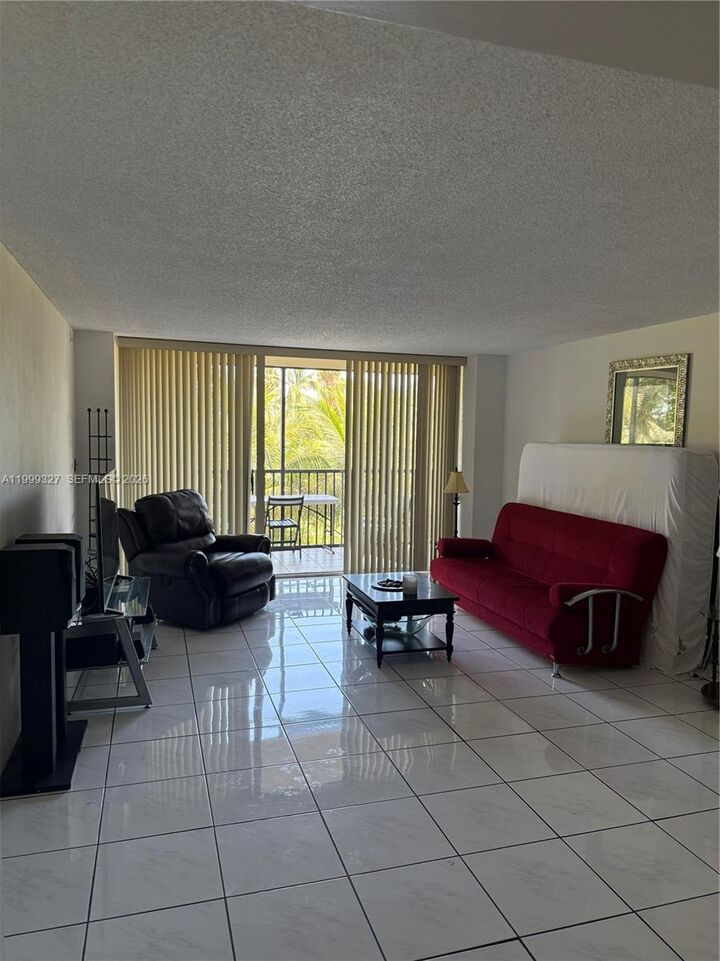 Property Photo:  20335 W Country Club Dr 206  FL 33180 