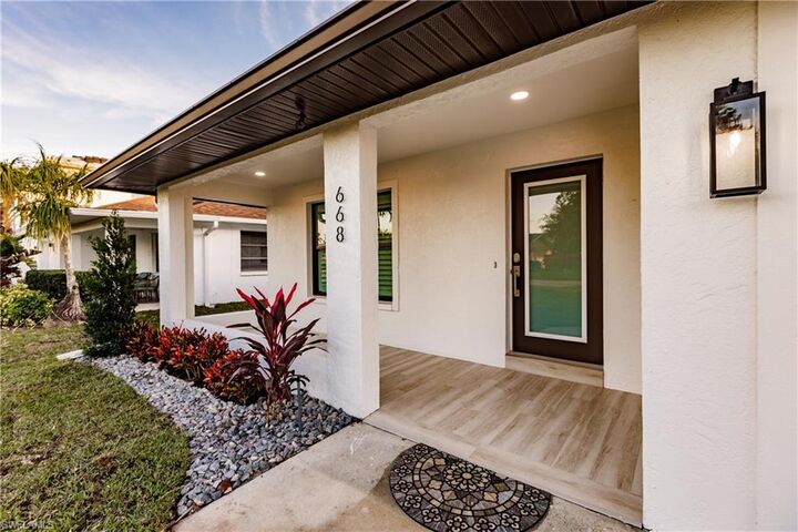 Property Photo: 668 104th Ave N FL 34108