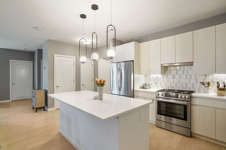 Property Photo:  45 W 3rd St 313  MA 02127 