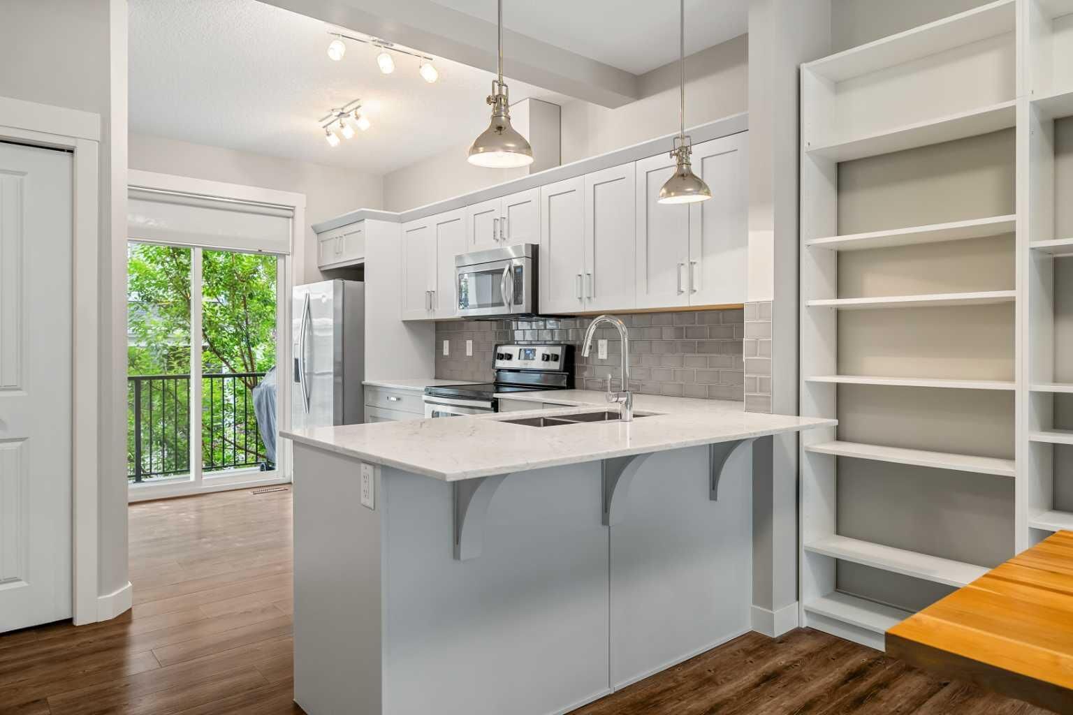 Property Photo:  355 Nolancrest Heights NW 203  AB T3R 0Z9 