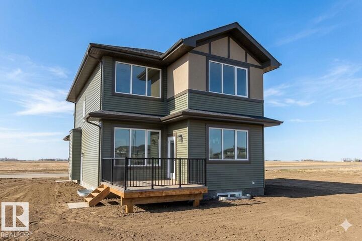 Property Photo:  8418 223 A Street NW  AB T5T 7X2 