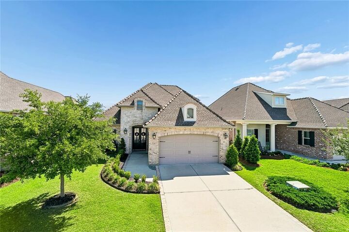 Property Photo:  334 Nicklaus Drive  LA 70458 