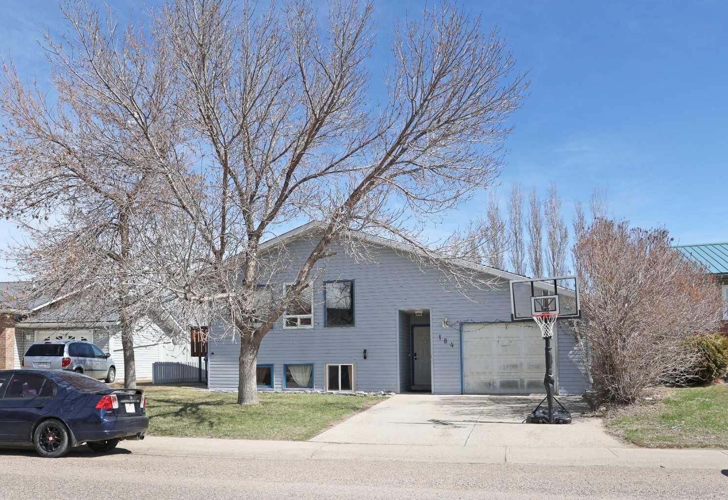 Photo de la propriété:  184 Upland Boulevard W  AB T1R 0R1 