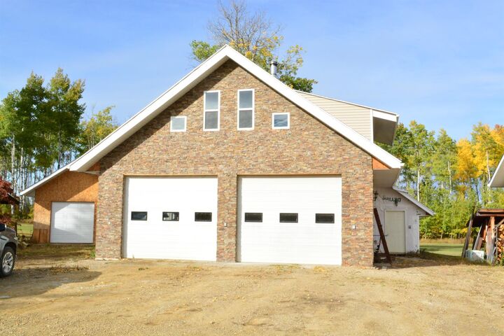 Property Photo: 221007 Twp 851A AB T8S 1S4