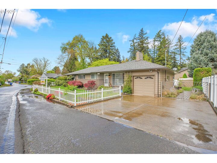 Property Photo:  5775 SE Westfork St  OR 97206 