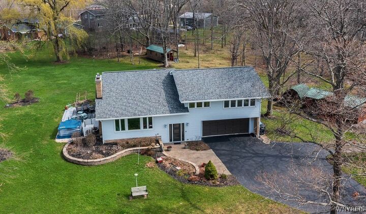 Property Photo:  1255 West River Road  NY 14072 