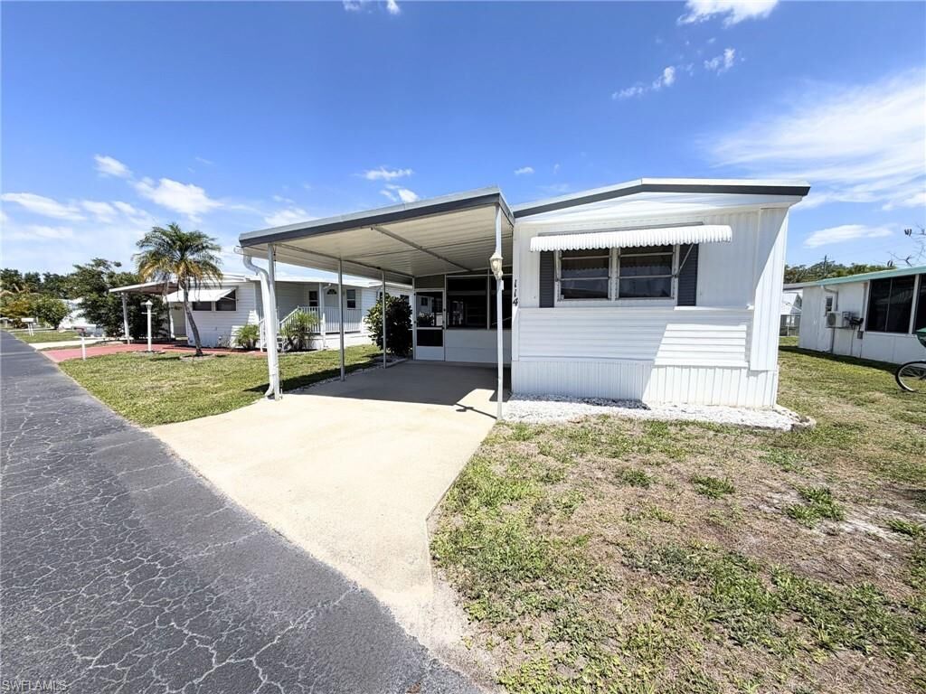 Property Photo:  114 Rose Ln 111  FL 34114 