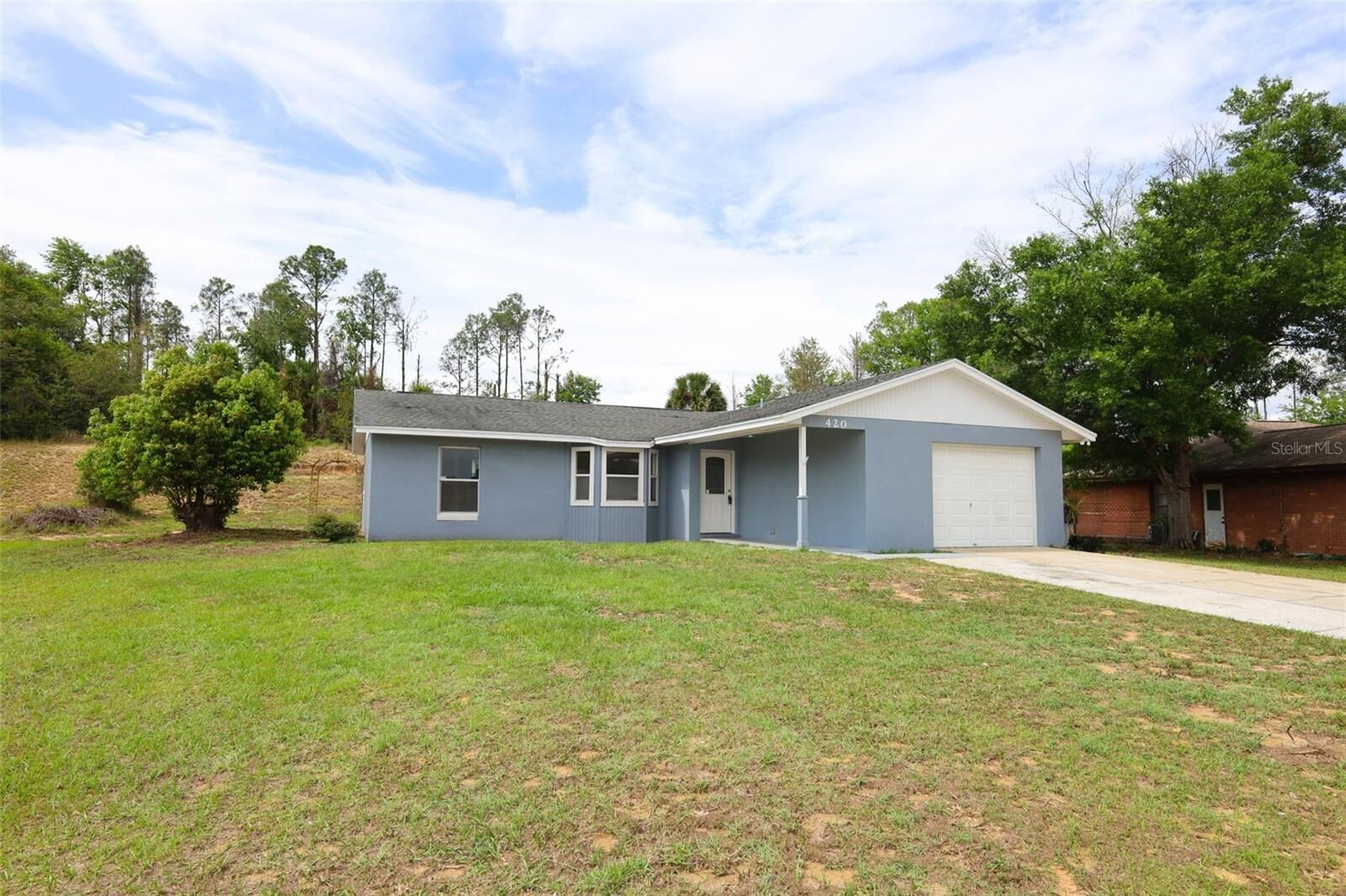 Property Photo:  420 Whitewing Circle  FL 34715 
