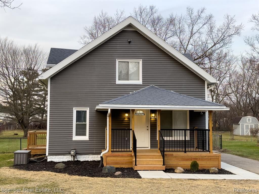 Property Photo: 6596 Maple Drive MI 48346 4400
