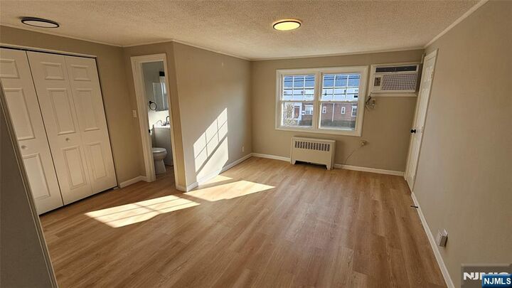 Property Photo:  64 Hastings B  NJ 07070 