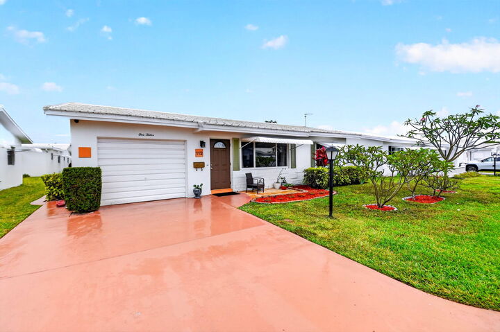 Property Photo: 112 SW 9th Street FL 33426
