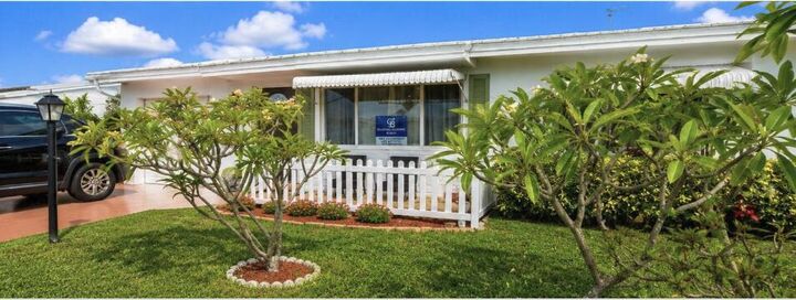 Property Photo:  112 SW 9th Street  FL 33426 