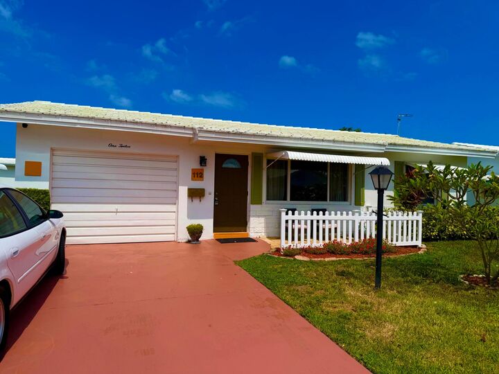 Property Photo: 112 SW 9th Street FL 33426