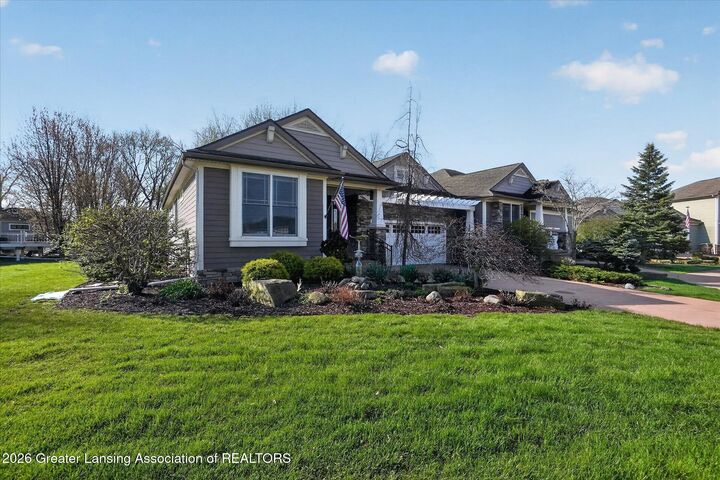 Property Photo:  605 Ibis Circle  MI 48823 