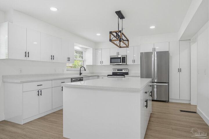 Property Photo:  8835 Burning Tree Rd  FL 32514 