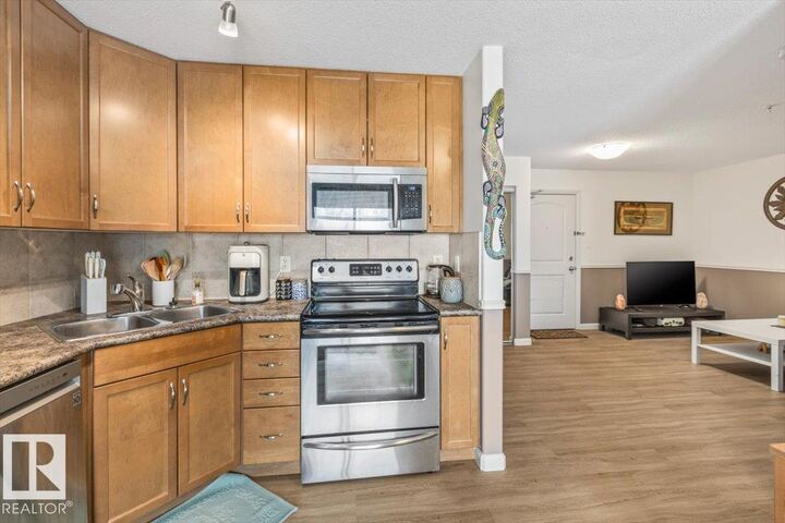 Property Photo:  1204 156 Street NW 106  AB T6R 0R6 