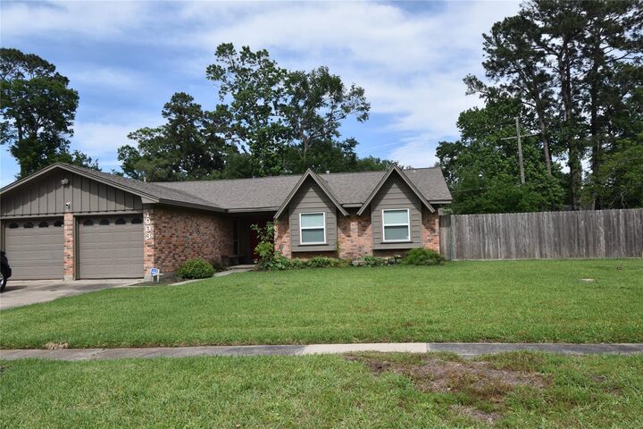 Property Photo:  1003 Timber Hill Drive  TX 77301 