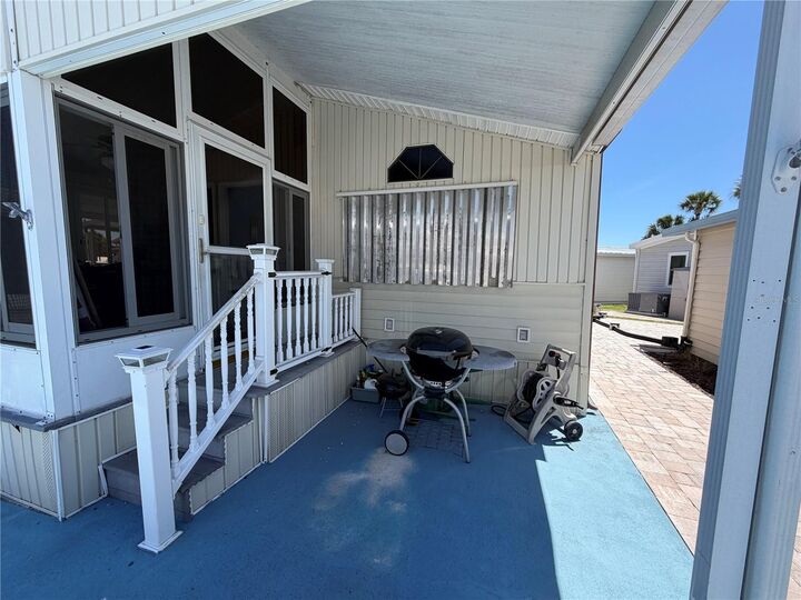 Property Photo:  9000 US Highway 192 650  FL 34714 