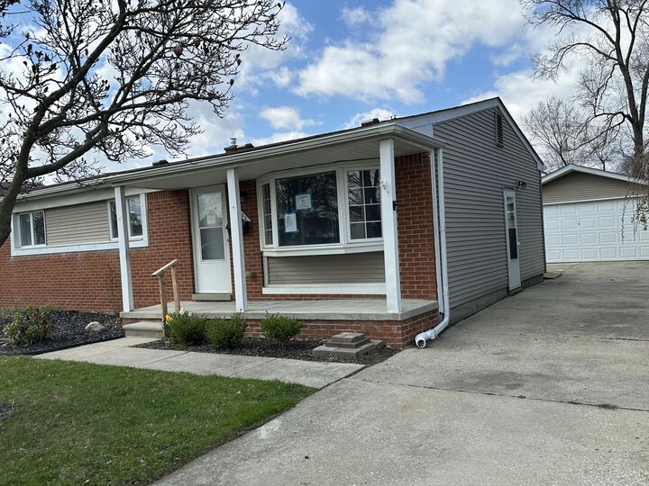 Property Photo:  31700 Lafler  MI 48173 