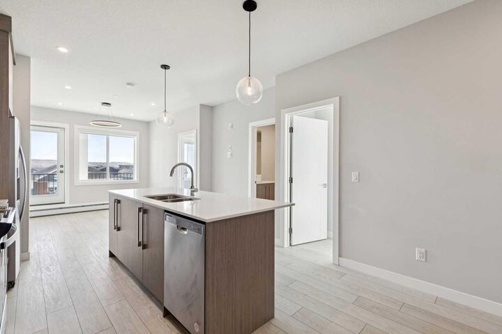 Property Photo: 111 Wolf Creek Drive SE 1305 AB T2X 5X2