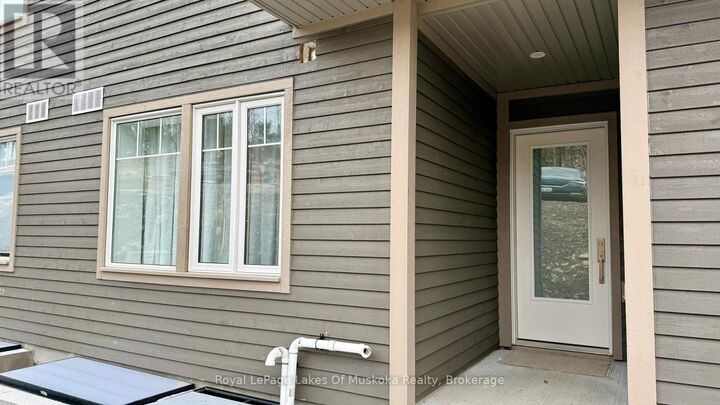 Property Photo: 11 Tree Tops Lane 203 ON P1H 0B8