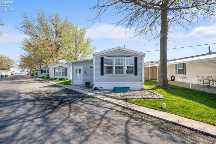 Property Photo:  8175 North Shore Boulevard 64  OH 43440 