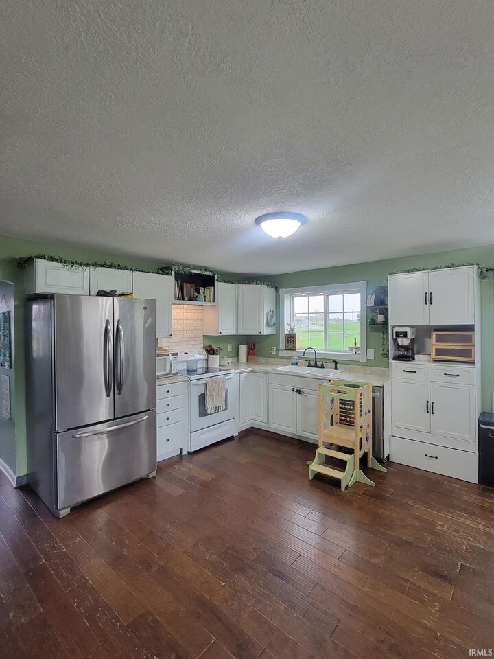 Property Photo:  1543 County Road 8  IN 46705 