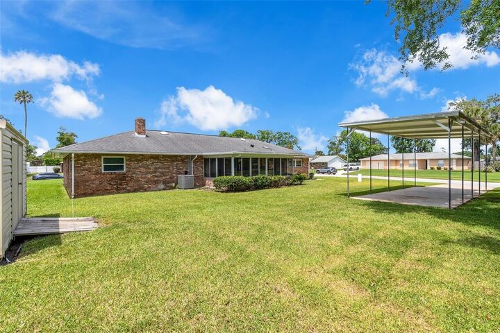 Property Photo:  801 Palm Grove Court  FL 32119 