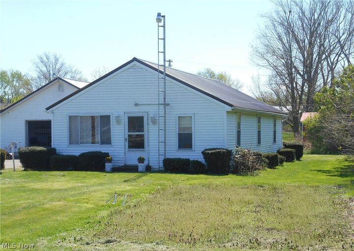 Property Photo:  5845 Woodman Avenue  OH 44004 