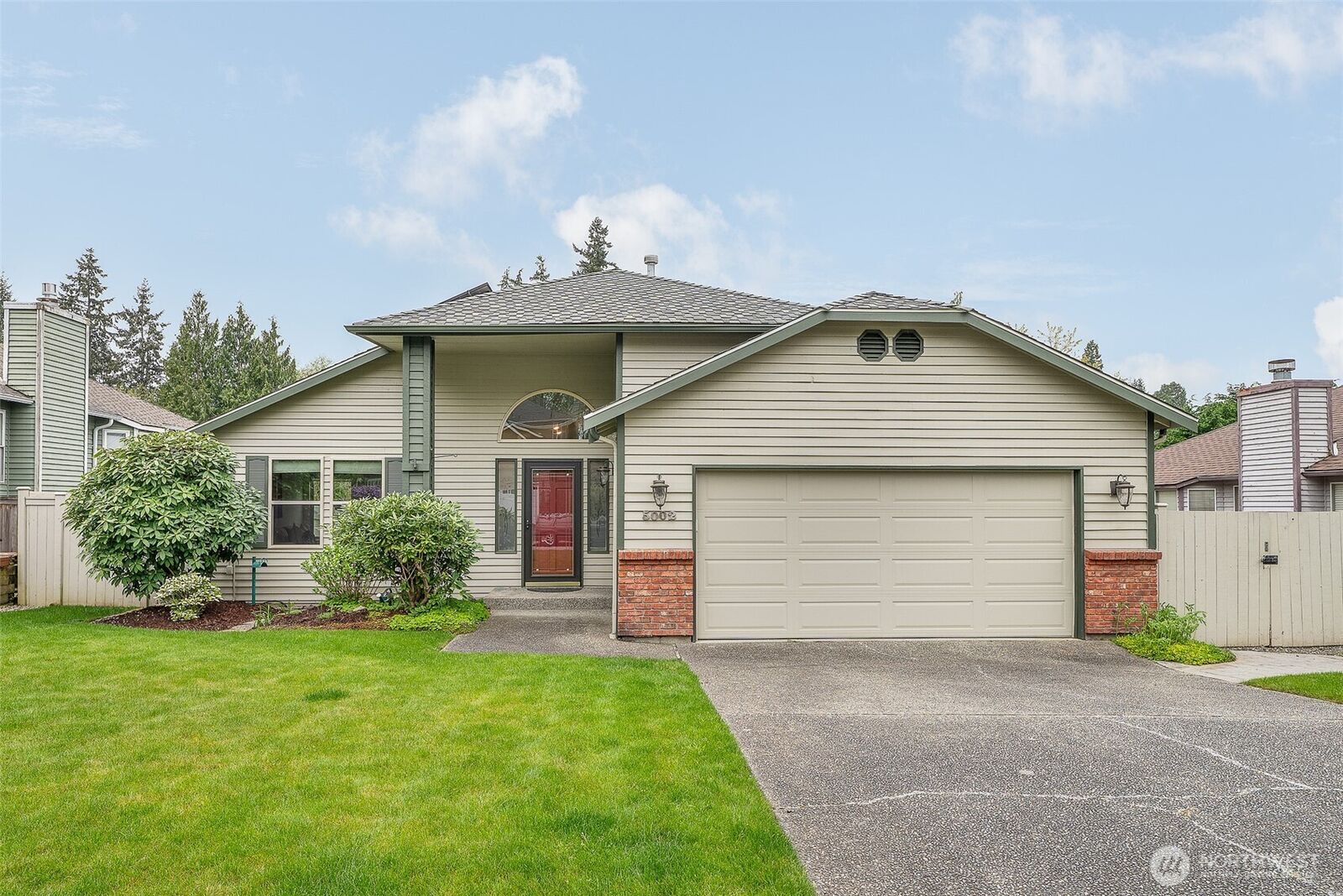 Property Photo:  5002  9th Avenue W  WA 98203 