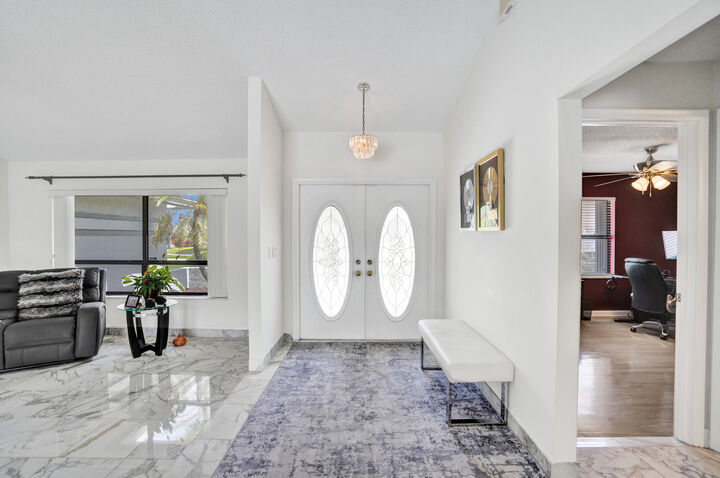 Property Photo:  9224 Sun Pointe Drive  FL 33437 