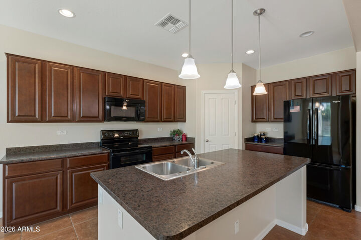 Property Photo:  14363 W Desert Flower Drive  AZ 85395 