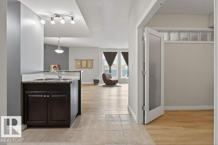 Property Photo:  9020 Jasper Avenue NW 408  AB T5H 3S8 