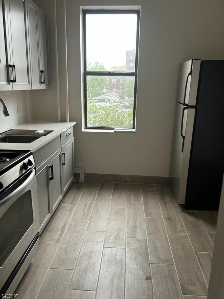 Property Photo:  7111 Palisade Ave B2  NJ 07047 