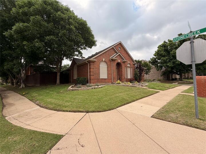 Property Photo:  8640 Woodcreek Drive  TX 75063 