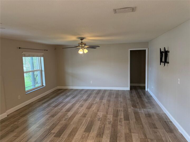 Property Photo:  1410 Saxon Boulevard  FL 32725 