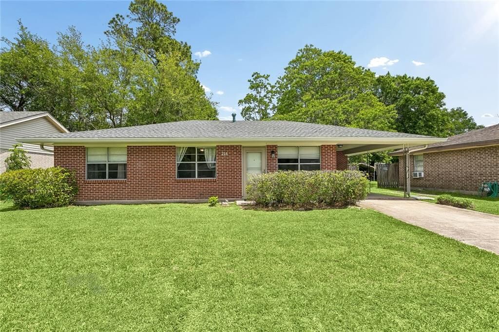 Property Photo:  214 Audubon Drive  LA 70458 