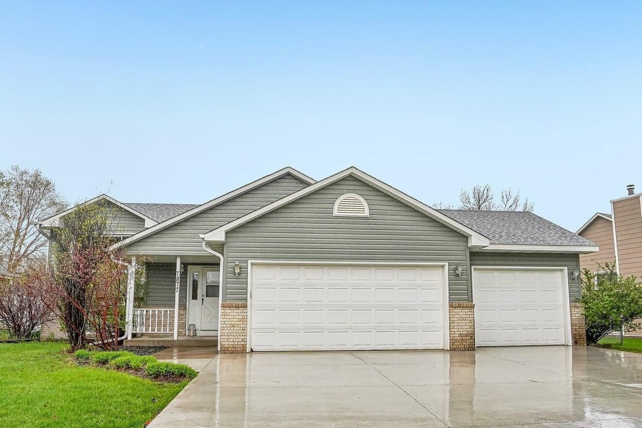 Property Photo:  7877 18th Street N  MN 55128 