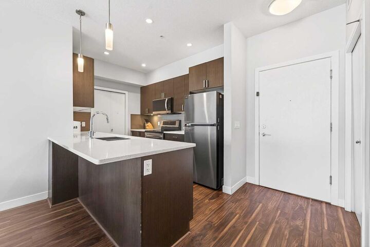 Property Photo: 16 Auburn Bay Link SE 301 AB T3M 1Z6