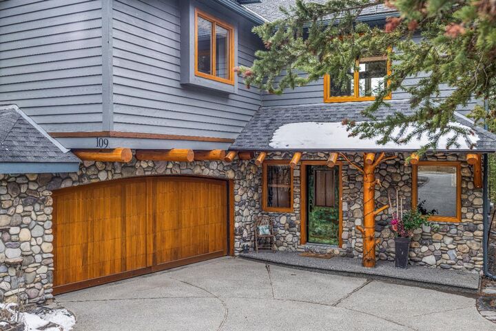 Property Photo: 109 Silvertip Ridge AB T1W 3A8