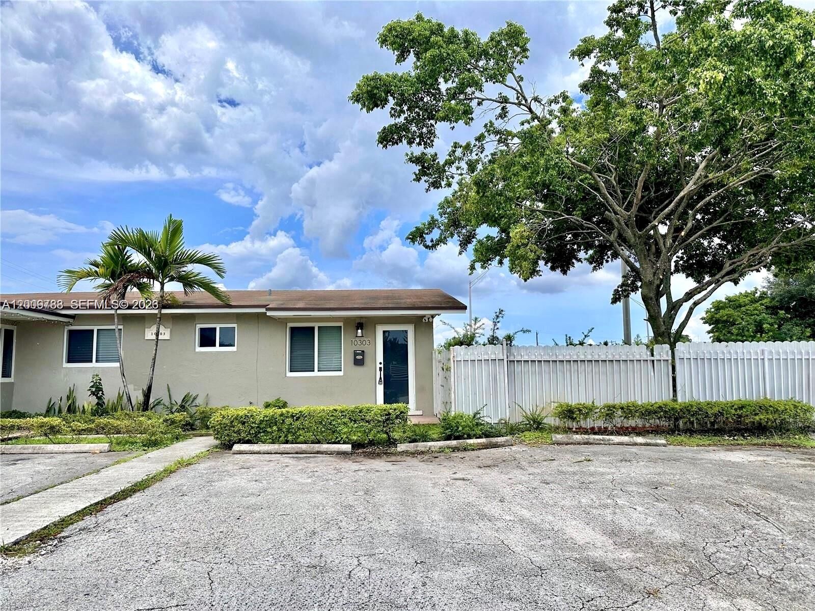 Property Photo:  10303 NW 35th Pl  FL 33147 