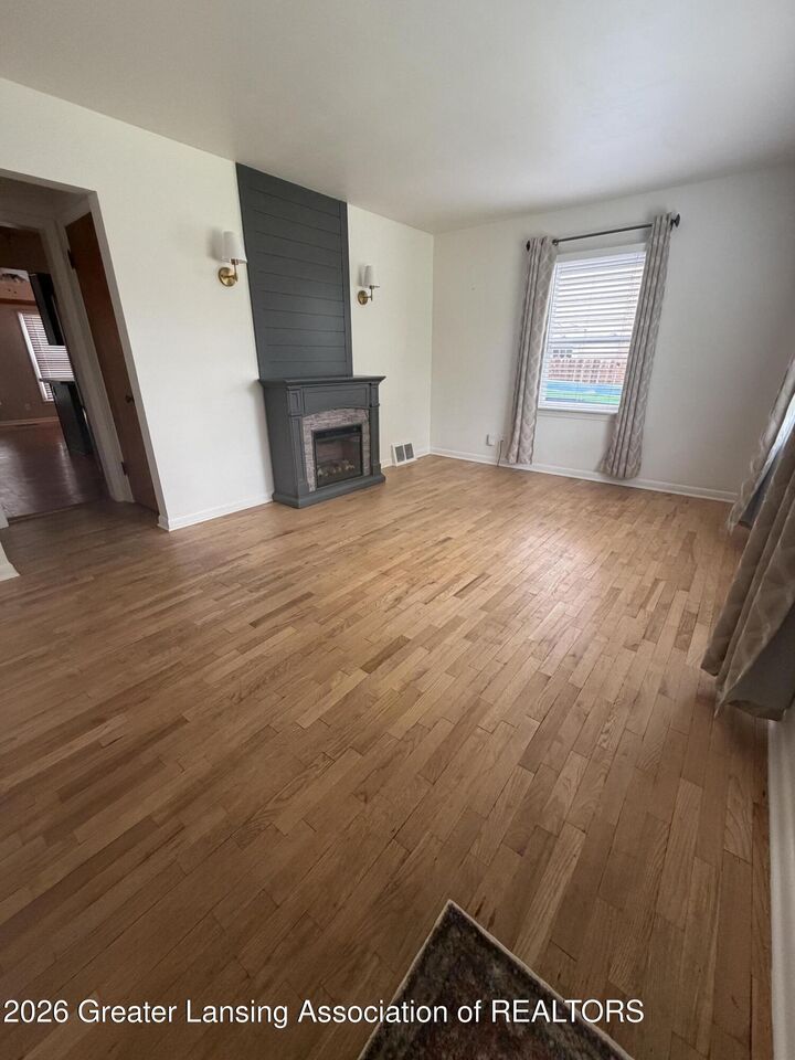 Property Photo:  1938 Cooper Avenue  MI 48910 