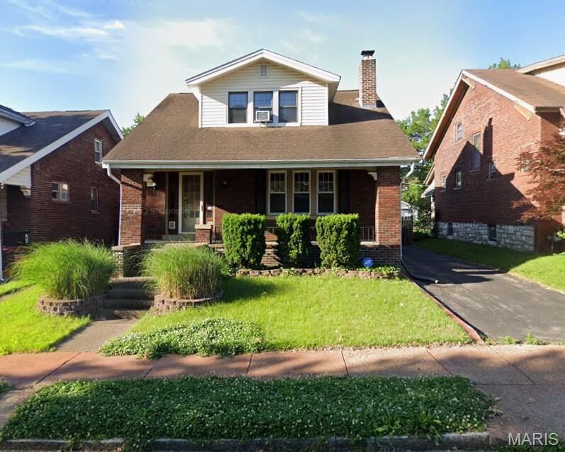 Property Photo:  1112 Hornsby Avenue  MO 63147 