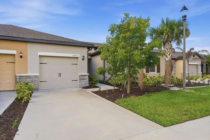Property Photo:  5303 Gladness Court  FL 34947 