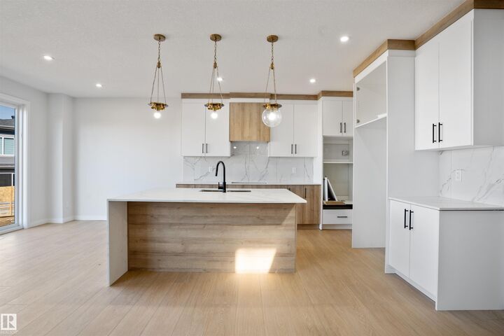 Property Photo: 1849 Crossbill Loop NW AB T5S 0W4