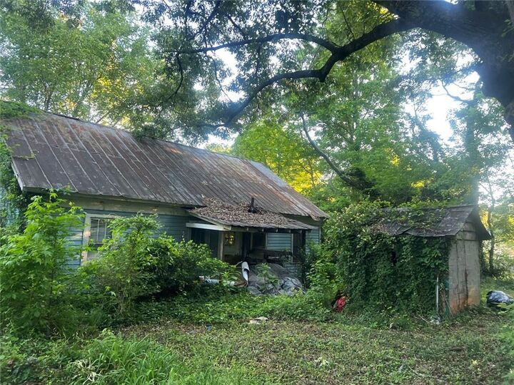 Property Photo:  5884 Rockbridge Road  GA 30087 