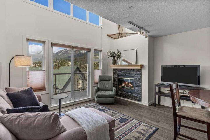 Property Photo: 160 Kananaskis Way 406 AB T1W 3E2