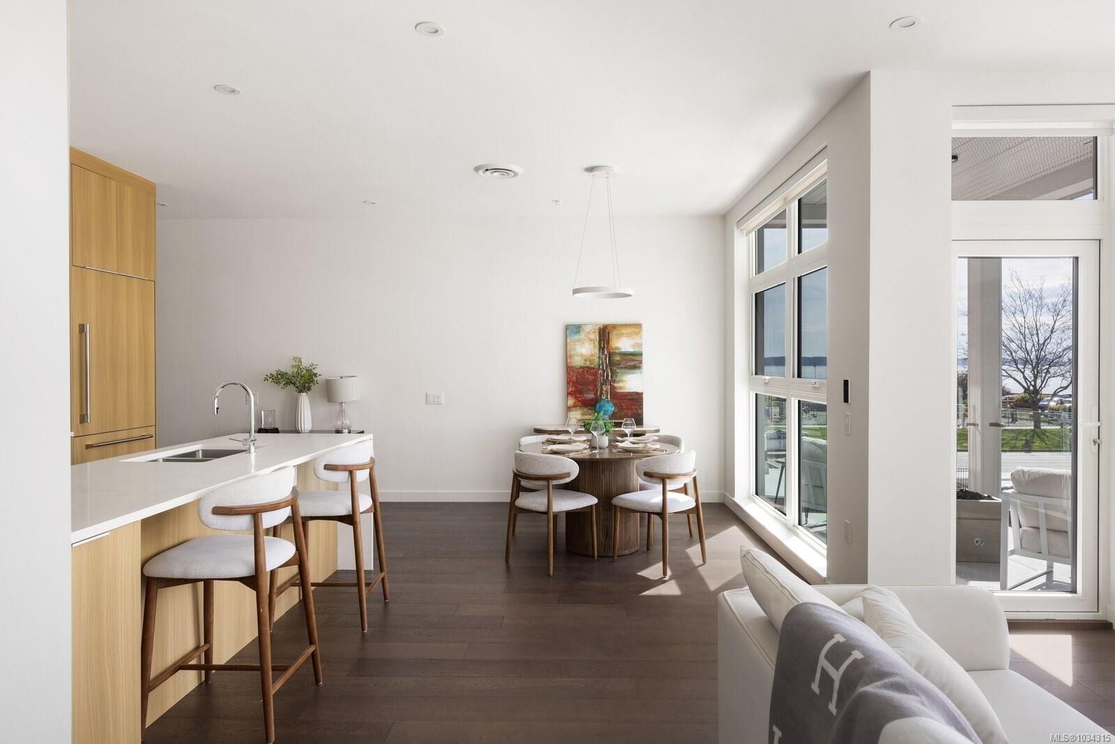 Property Photo:  9570 Fifth St 206  BC V8L 2W5 