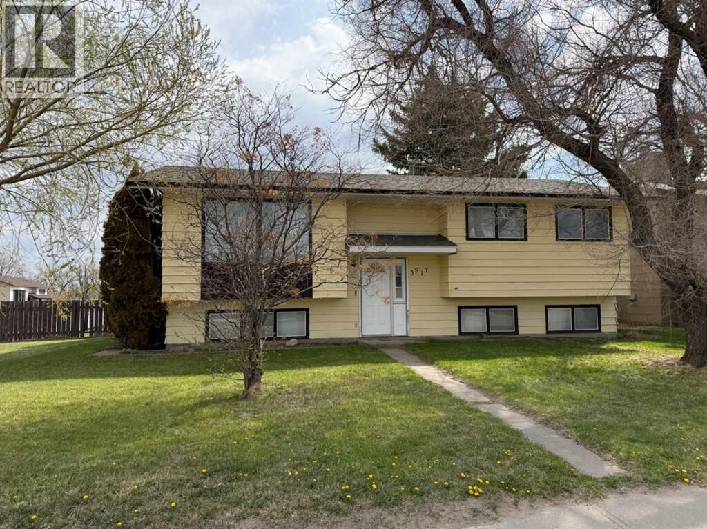 Property Photo:  3917 52 Street  AB T1G 1B7 